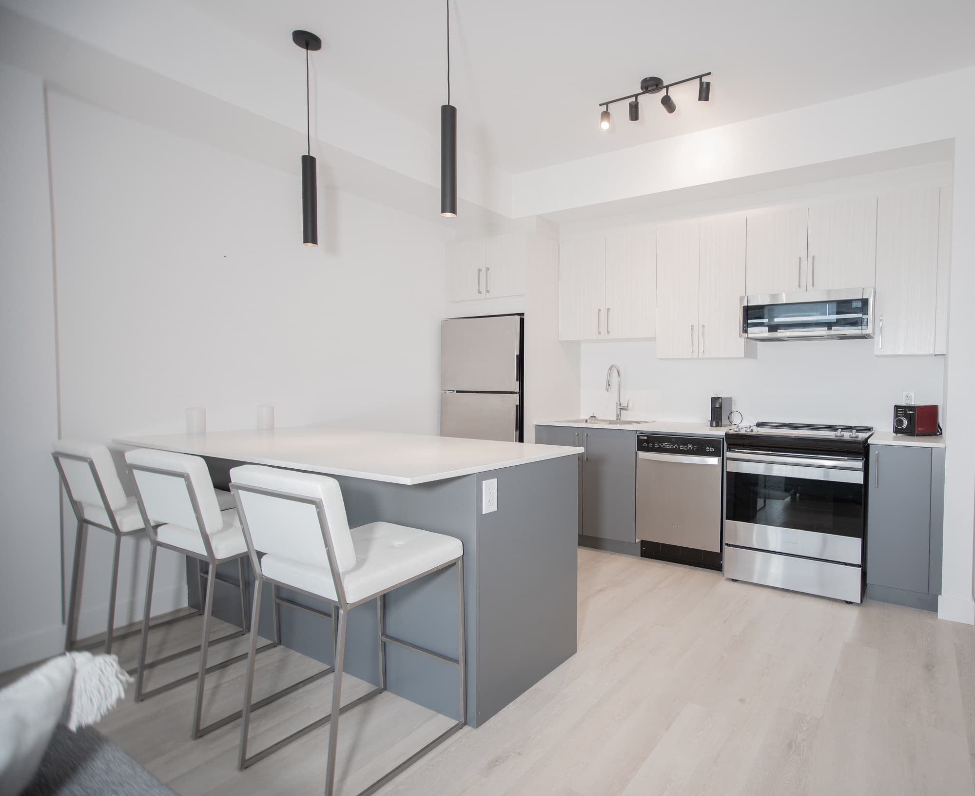 A kitchen in a British Square suite